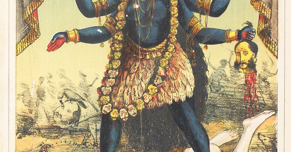 महाकाल — काल के देवता, शिव का तांत्रिक रूप। गहरी नीली त्वचा, क्रोधपूर्ण चेहरा, और विनाश की मुद्रा में। यह छवि बीभत्स रस के अधिदेवता को दर्शाती है।