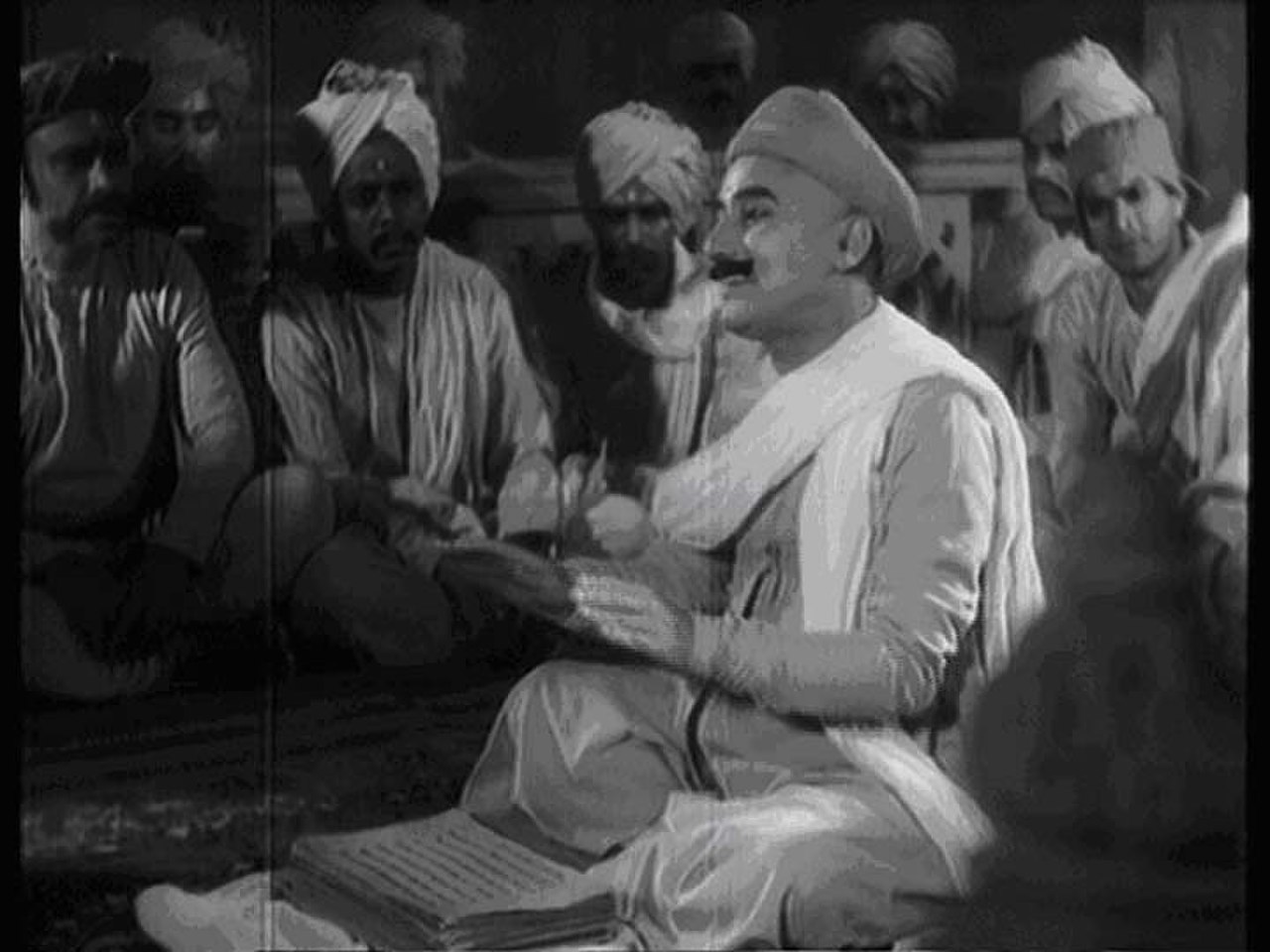 प्रभात फ़िल्म कंपनी की 1935 की फ़िल्म 'धर्मात्मा' का एक दृश्य, निर्देशक वी. शांताराम — यह मराठी-हिन्दी द्विभाषी संत-फ़िल्म, जिसमें मराठी रंगमंच के दिग्गज बालगंधर्व ने सोलहवीं सदी के संत-कवि एकनाथ की भूमिका निभाई